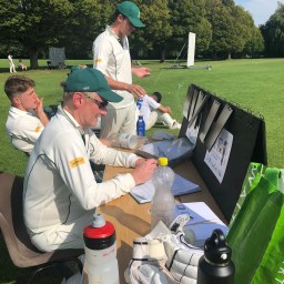 The Racqueteers in action v Barely Bluies